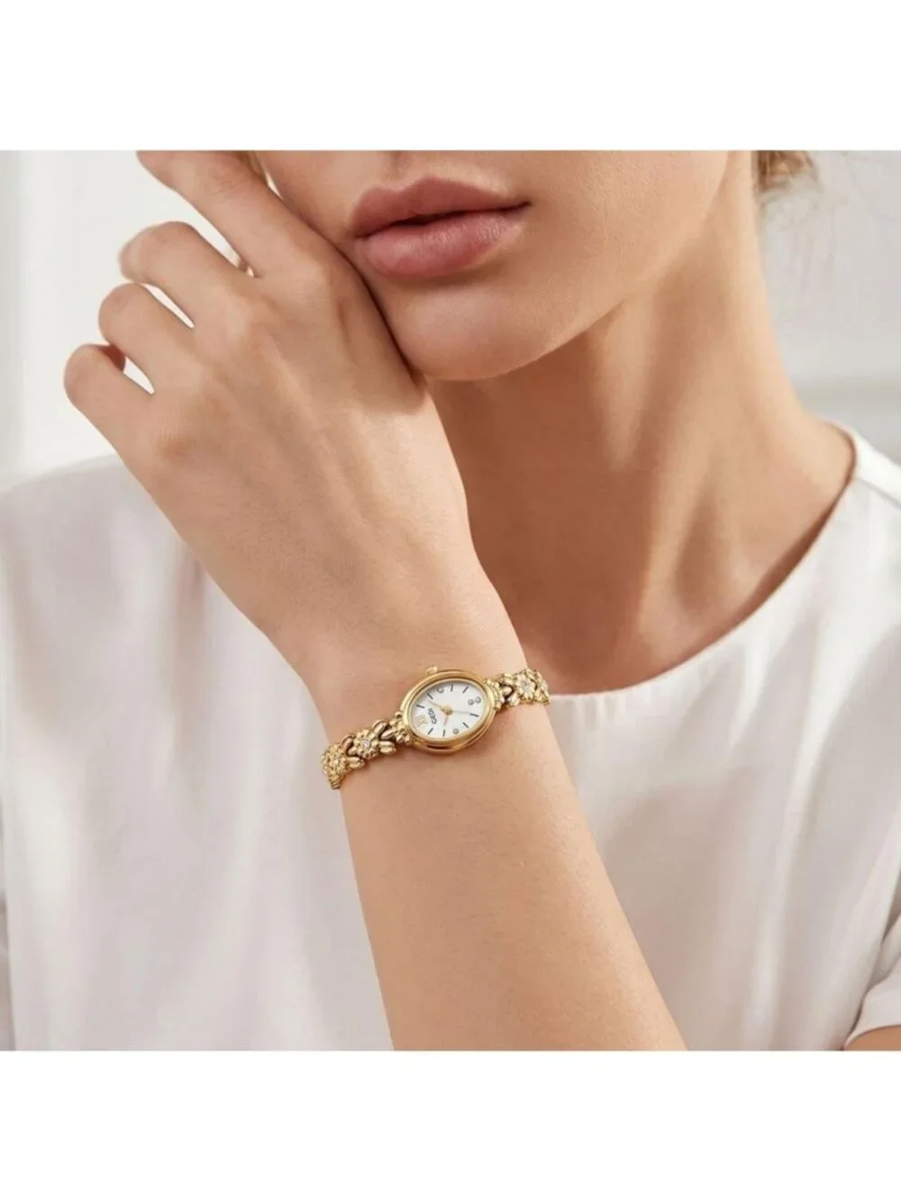 Women Gold And White Analog Quartz Alloy Steel Oval Roman Numeral Bracelet Watch